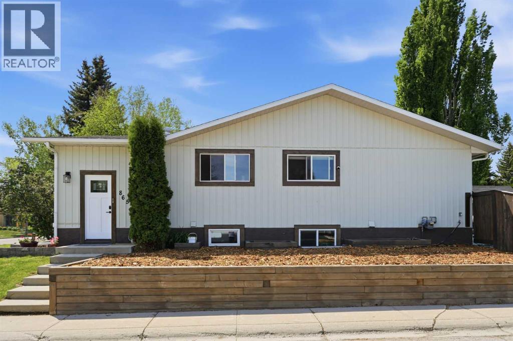 865 Queensland Drive Se, Calgary, Alberta  T2J 5E4 - Photo 1 - A2314487