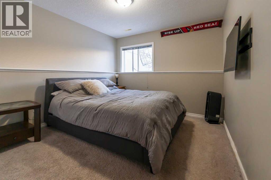 65 Heritage Circle W, Lethbridge, Alberta  T1K 7T3 - Photo 38 - A2289412