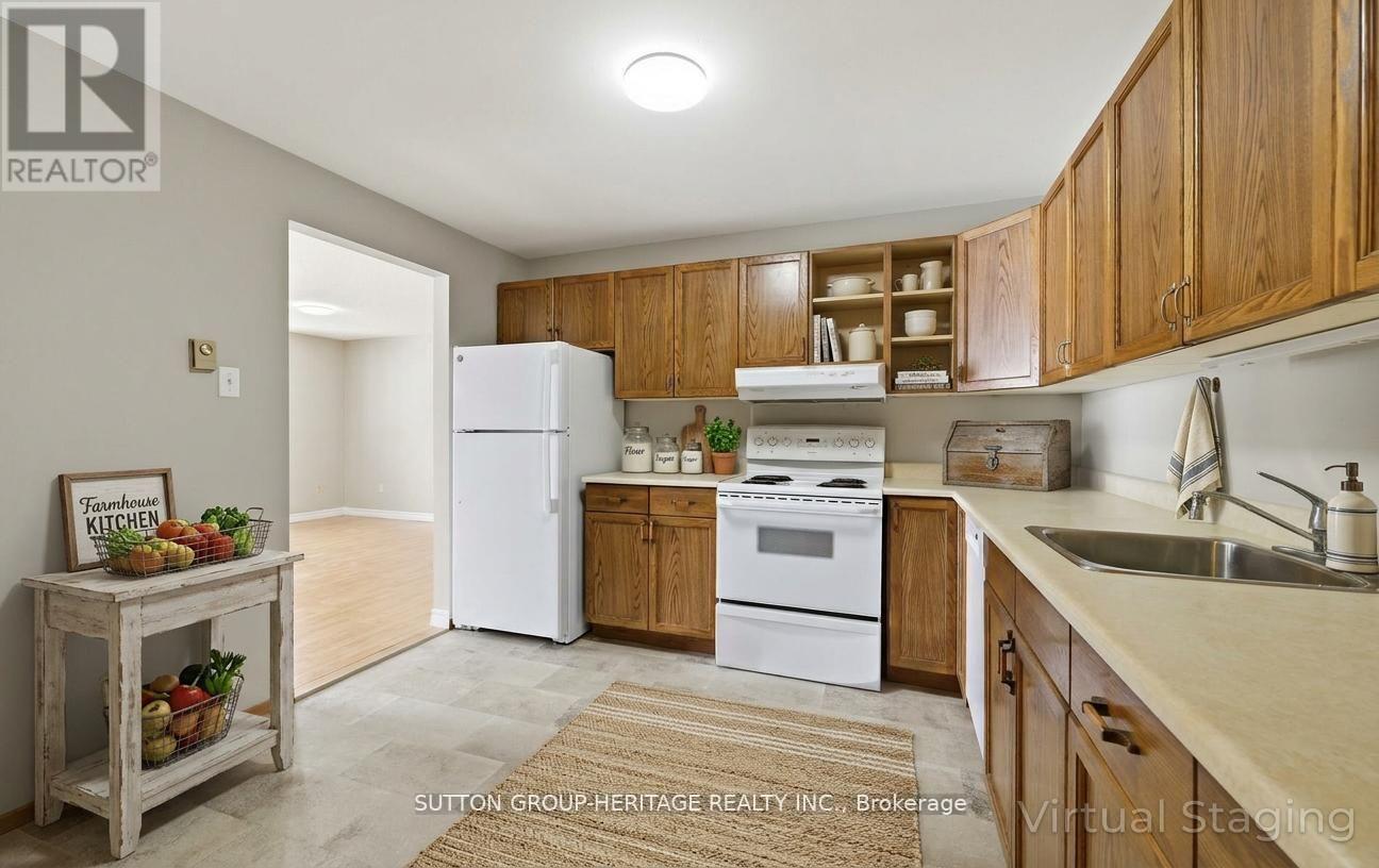 102 - 2418 Mountland Drive, Peterborough, Ontario  K9K 2E2 - Photo 7 - X12911336