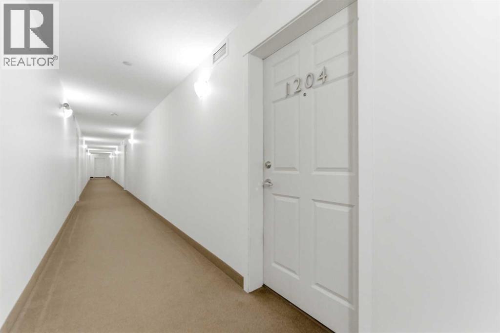 1204, 755 Copperpond Boulevard Se, Calgary, Alberta  T2Z 4R2 - Photo 2 - A2316687