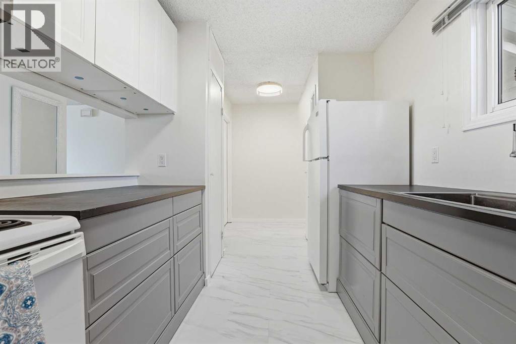 13, 131 Templehill Drive Ne, Calgary, Alberta T1Y 4T1 - Photo 8 - A2316541
