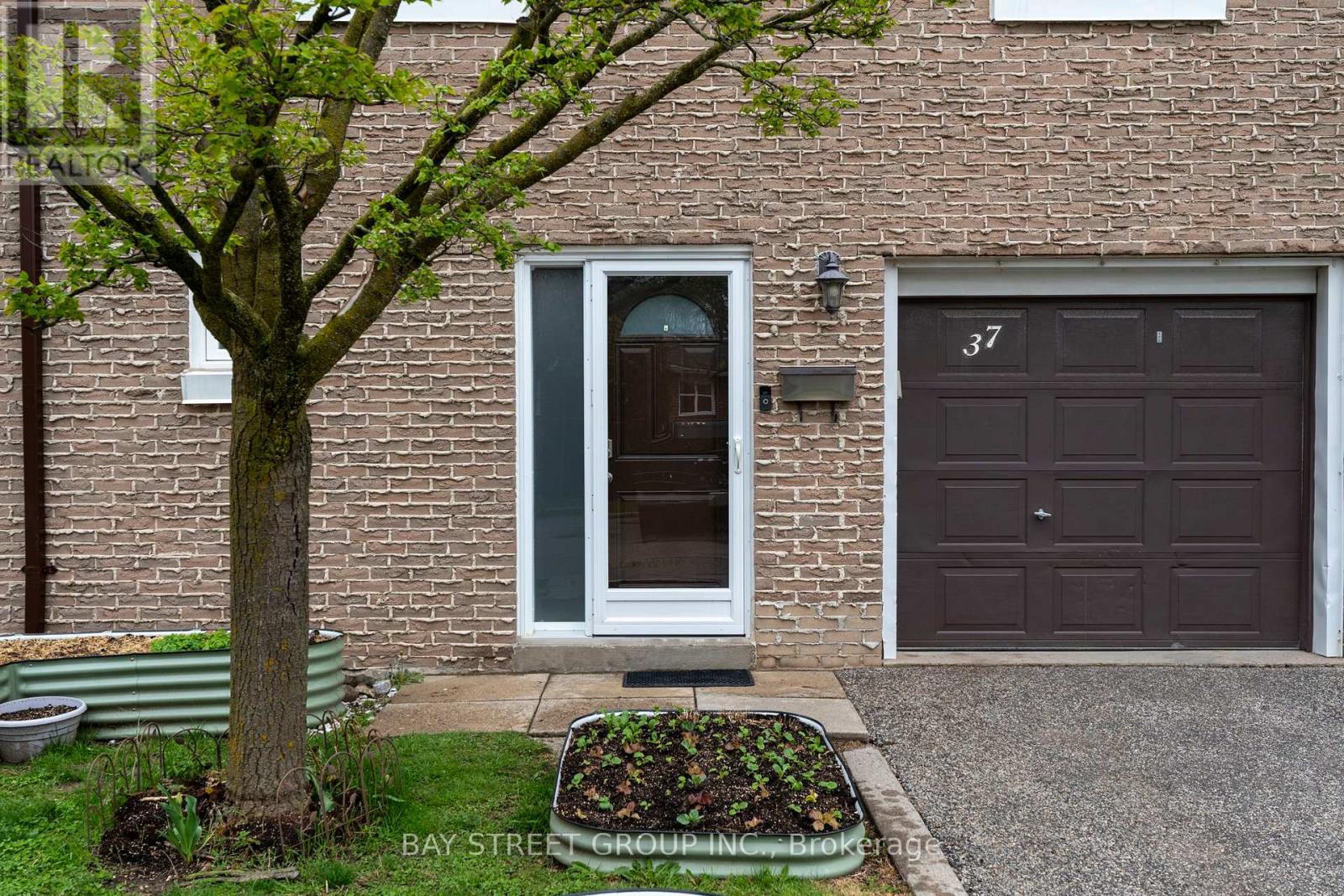 37 - 671 Huntingwood Drive, Toronto, Ontario  M1W 1H6 - Photo 2 - E13228456