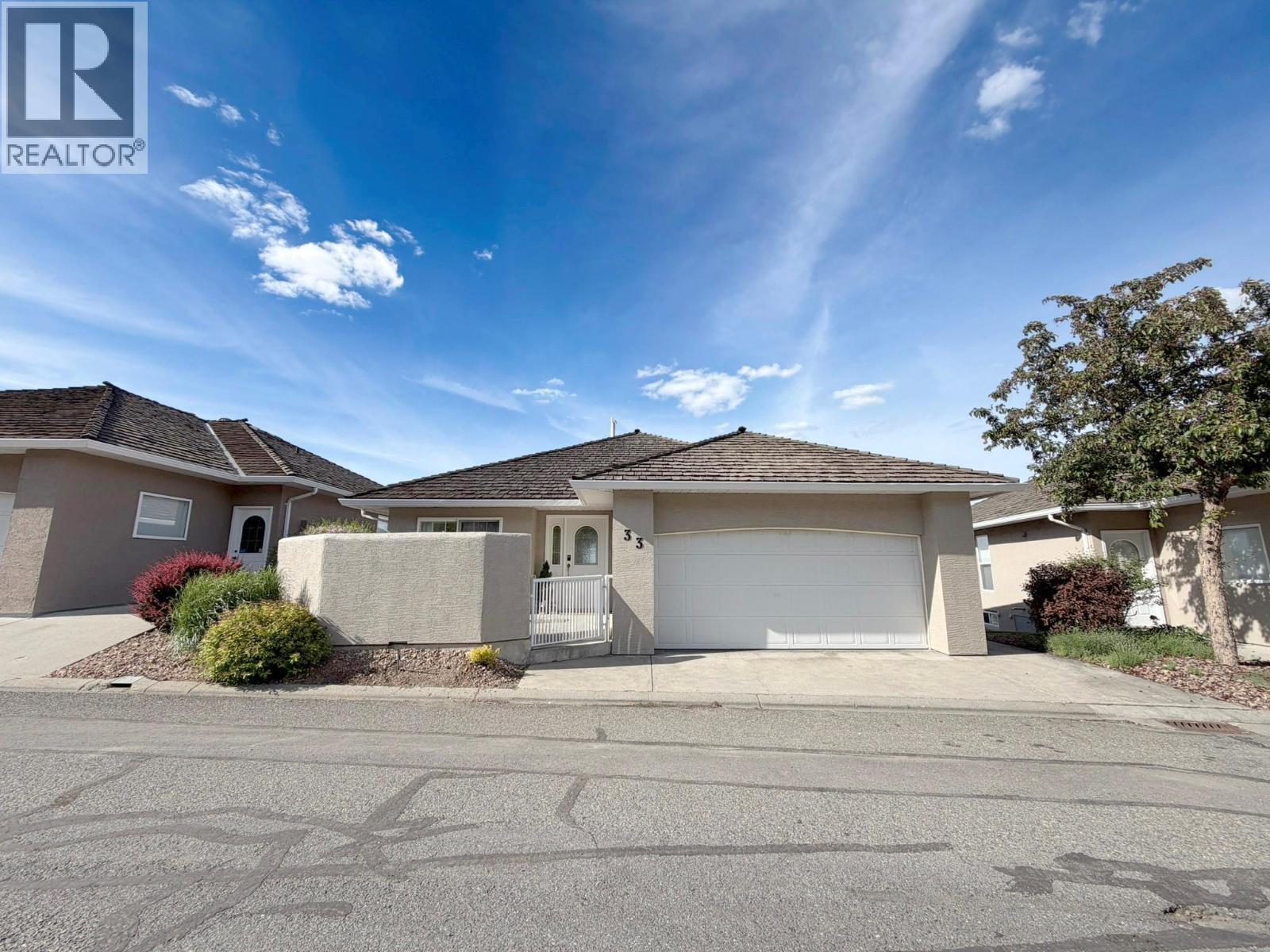 Your dream home awaits in this centrally-located Executive Aberdeen home, where comfort & breathtaking scenery come together! Perched to capture stunning panoramic views, this bright & spacious home offers an open main living area filled w/ tons of natural light. Relax by the cozy fireplace or step onto the balcony to take in the spectacular views. The modern kitchen is designed to impress, flowing seamlessly into two dining areas on either side & features all-new SS appliances. The main floor also offers a big primary bedroom w/ a walk-in closet & a 4-pc ensuite w/ a jacuzzi tub, along w/ a second bedroom & a second full bathroom. Downstairs, you’ll find an impressive basement w/ two large bedrooms, a third bathroom, a flex space, extra storage, & a spacious family room highlighted by a gas fireplace & access to the yard—ideal for guests, hobbies, or multigenerational living. Recent updates incl all-new lighting, newly-painted exterior & updated plumbing plus the peace of mind of a smart water detection system that automatically shuts off the home’s water supply when there's a leak. The oversized double-car garage & onsite RV parking is a bonus. Nestled in a quiet community, owners enjoy access to the Cactus Clubhouse - perfect for events & family gatherings. This exceptional home offers the perfect blend of functionality and low-maintenance living, while being conveniently located to several amenities incl parks, schools & shopping. Don't miss out - book your showing today! (id:48254)