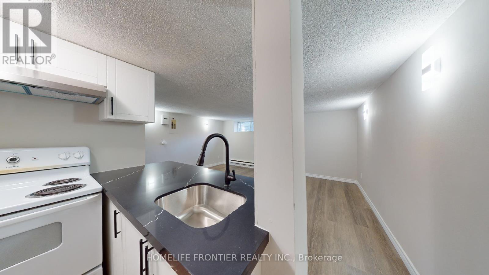 3 - 79 Redwood Avenue, Toronto, Ontario  M4L 2S5 - Photo 7 - E13229730