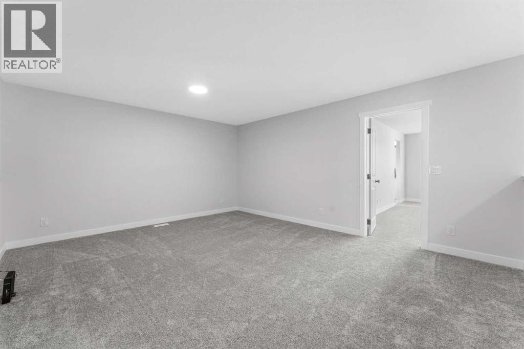 107 Versant View Sw, Calgary, Alberta  T2Y 0X3 - Photo 11 - A2316779