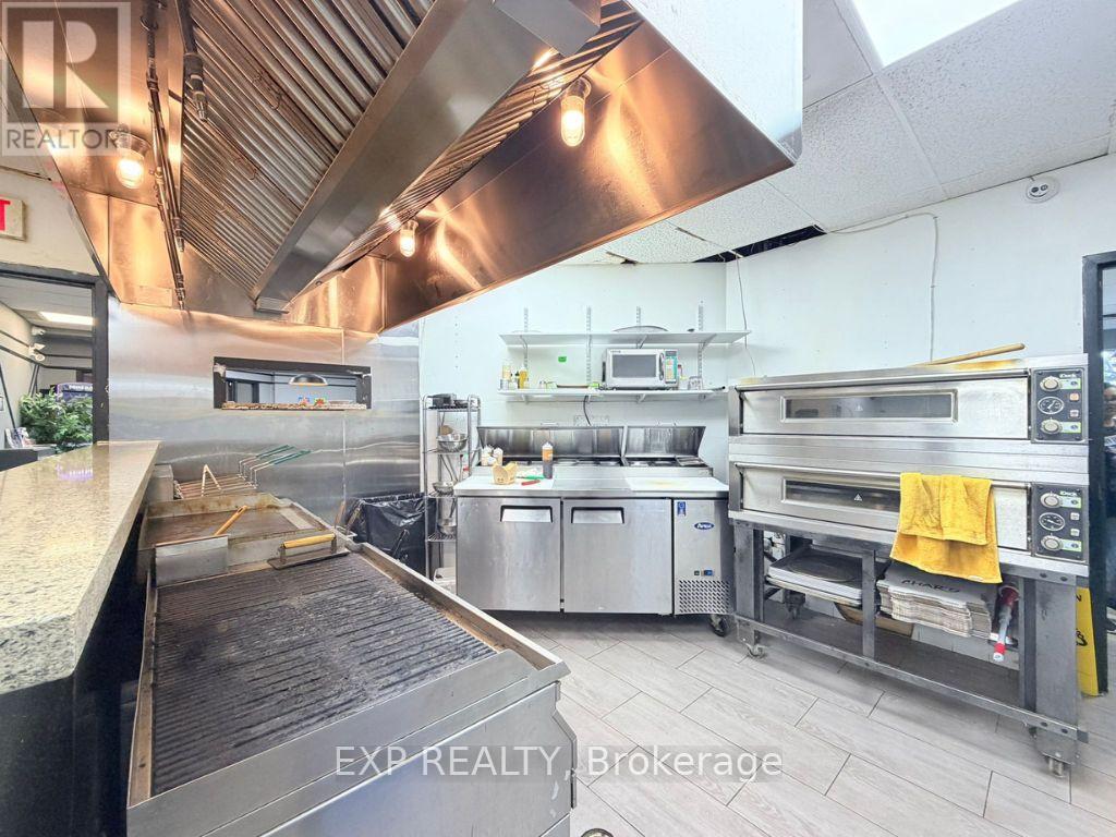 #100 - 700 Dorval Drive, Oakville, Ontario  L6K 3V3 - Photo 21 - W13230804
