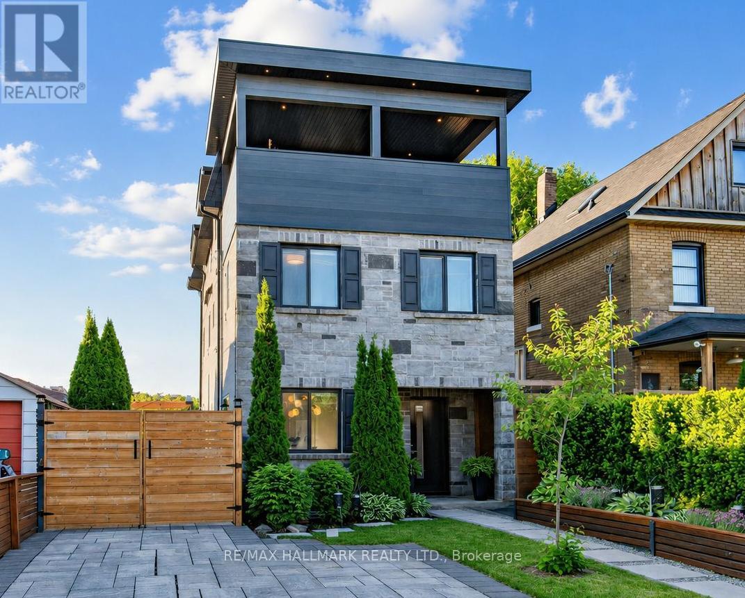 <div class="slider-price">$1,099,000</div><p>4a Midburn Avenue, Toronto, Ontario</p>