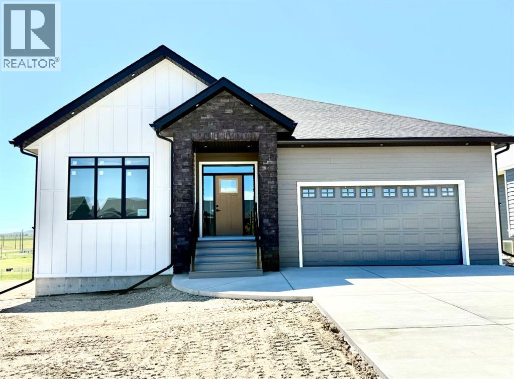 131 Westview Drive, Nanton, Alberta  T0L 1R0 - Photo 1 - A2273159