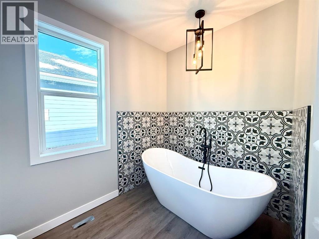 131 Westview Drive, Nanton, Alberta  T0L 1R0 - Photo 18 - A2273159