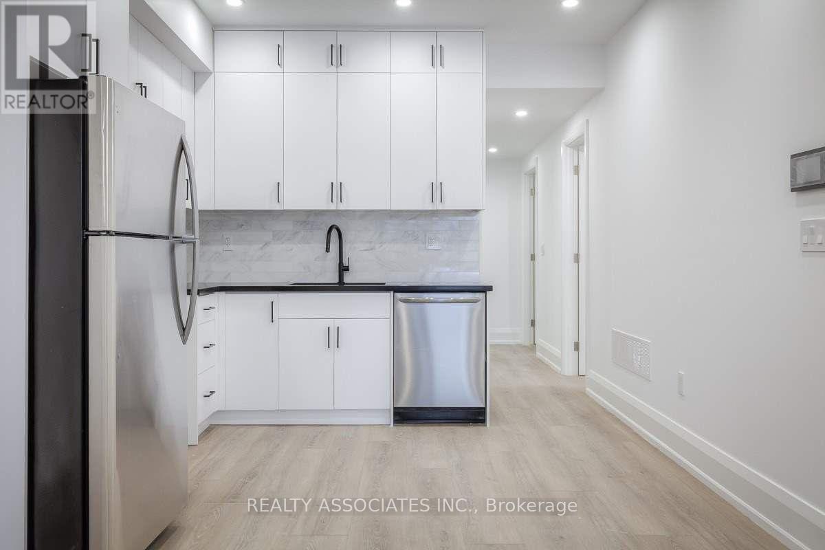Unit 1a - 31 Ennerdale Road, Toronto, Ontario  M6E 4C2 - Photo 12 - W13232468