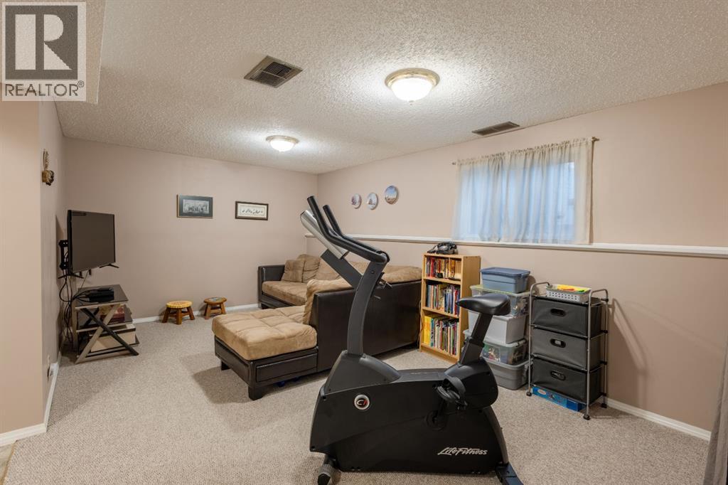 62 Berkley Close Nw, Calgary, Alberta  T3K 1B3 - Photo 16 - A2317180