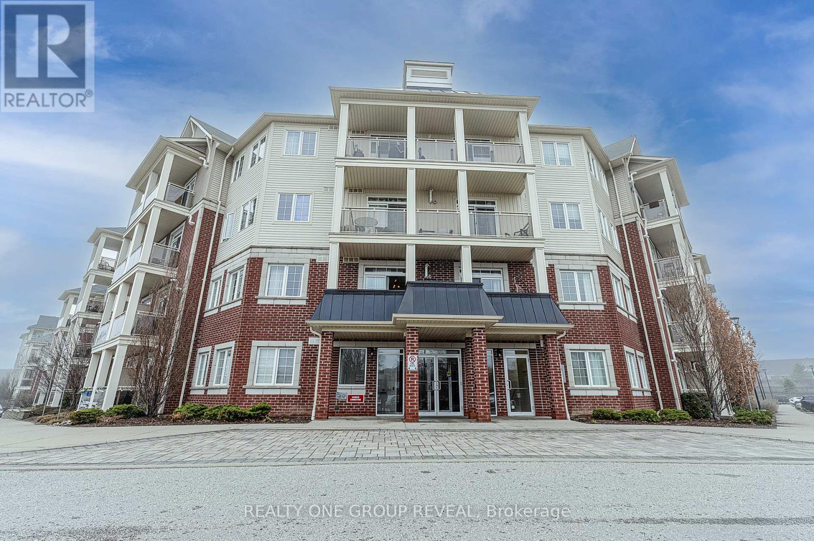 210 - 80 Aspen Springs Drive, Clarington, Ontario  L1C 0V4 - Photo 1 - E13234890