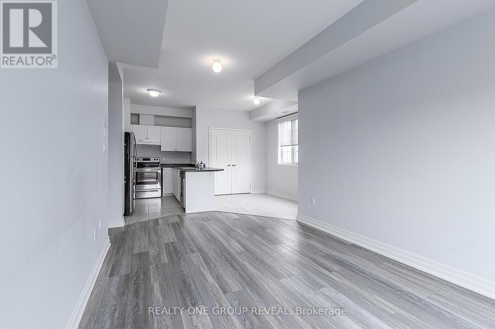 210 - 80 Aspen Springs Drive, Clarington, Ontario  L1C 0V4 - Photo 4 - E13234890