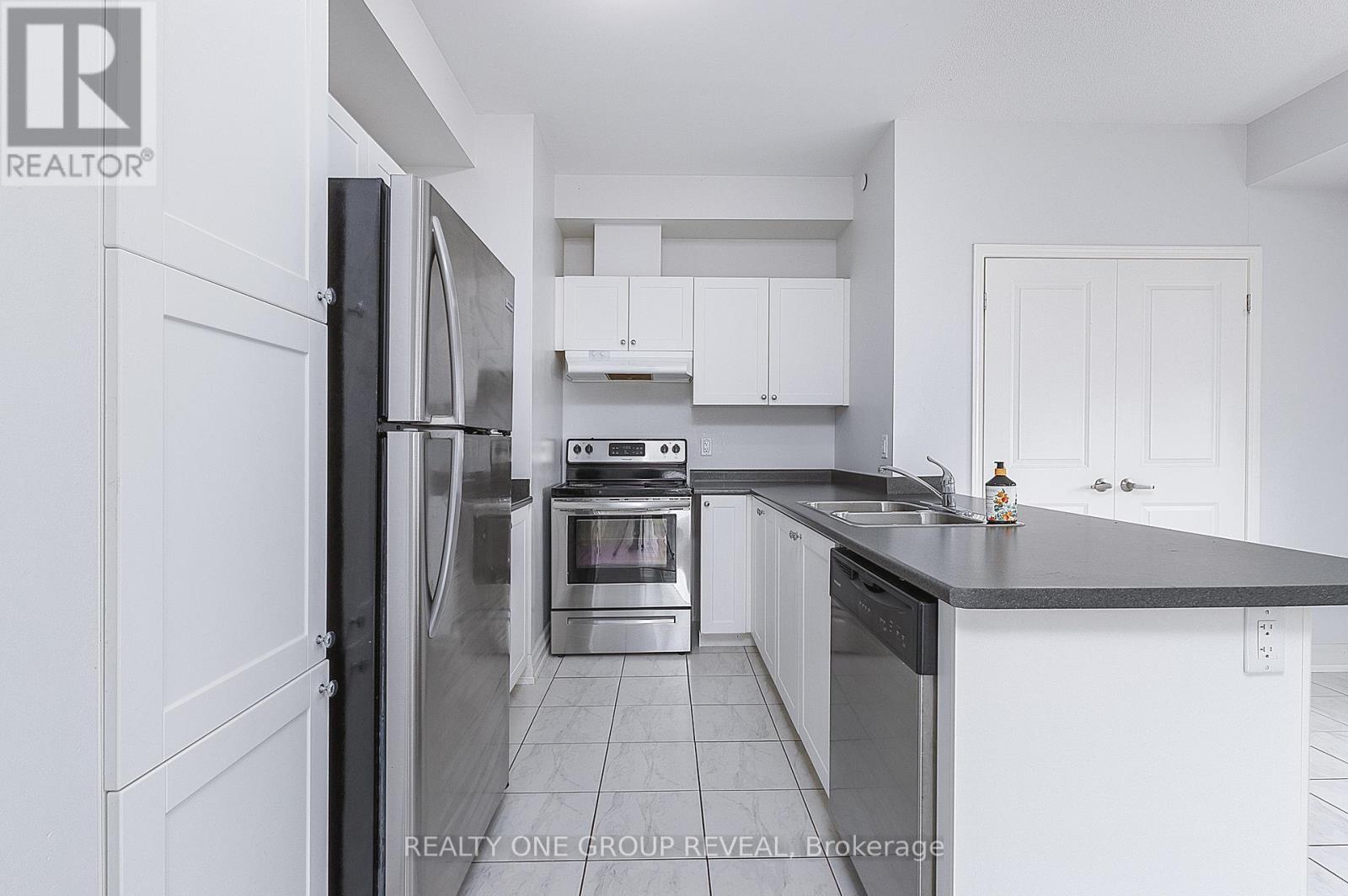 210 - 80 Aspen Springs Drive, Clarington, Ontario  L1C 0V4 - Photo 9 - E13234890