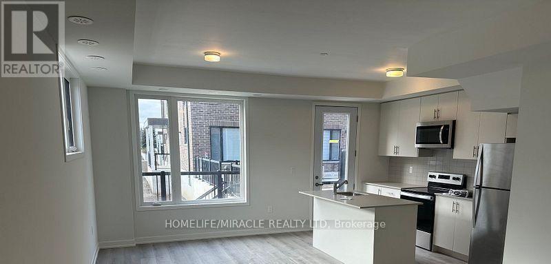 02 - 3415 Ridgeway Drive, Mississauga, Ontario  L5L 0B9 - Photo 3 - W13235032
