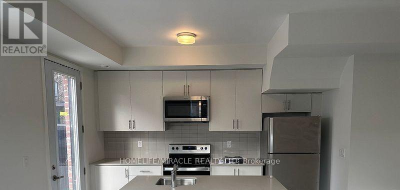 02 - 3415 Ridgeway Drive, Mississauga, Ontario  L5L 0B9 - Photo 4 - W13235032