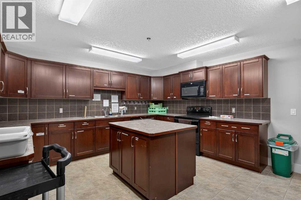 203, 77 George Fox Trail, Cochrane, Alberta  T4C 0N1 - Photo 13 - A2295000