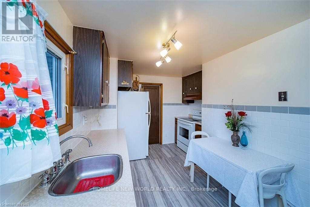 Side - 6568 Orchard Avenue, Niagara Falls, Ontario  L2G 4H5 - Photo 10 - X13236286