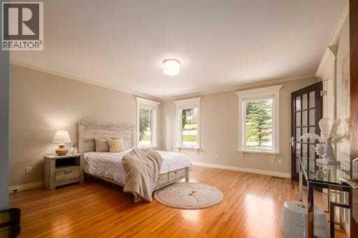 57 Slopes Point Sw, Calgary, Alberta  T3H 3Y8 - Photo 38 - A2317702