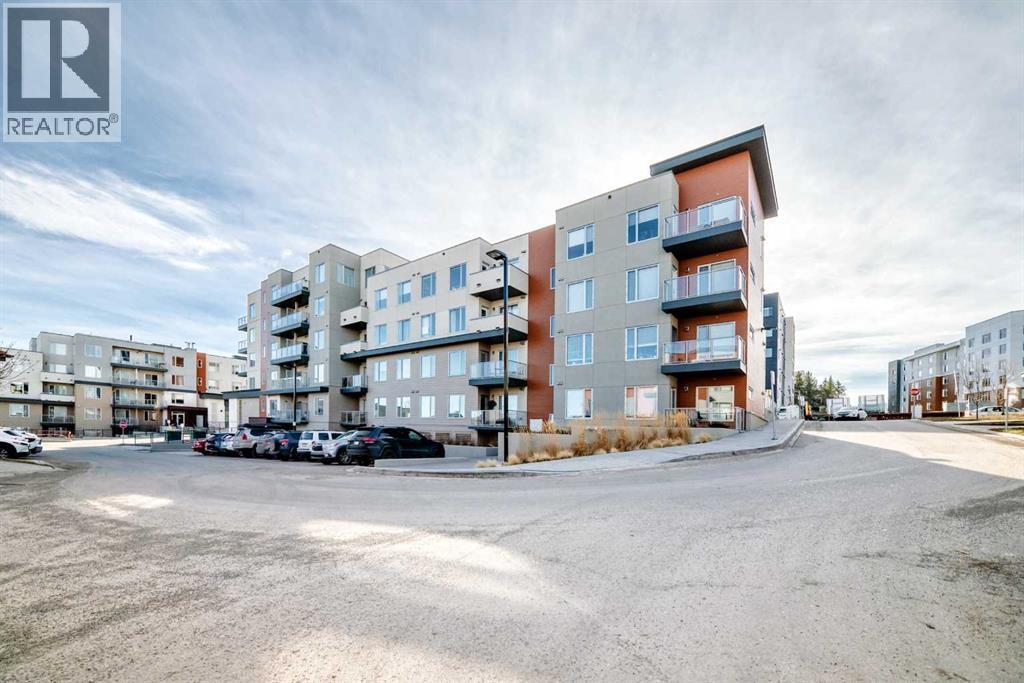 108, 71 Shawnee Common Sw, Calgary, Alberta  T2Y 0R2 - Photo 1 - A2317711