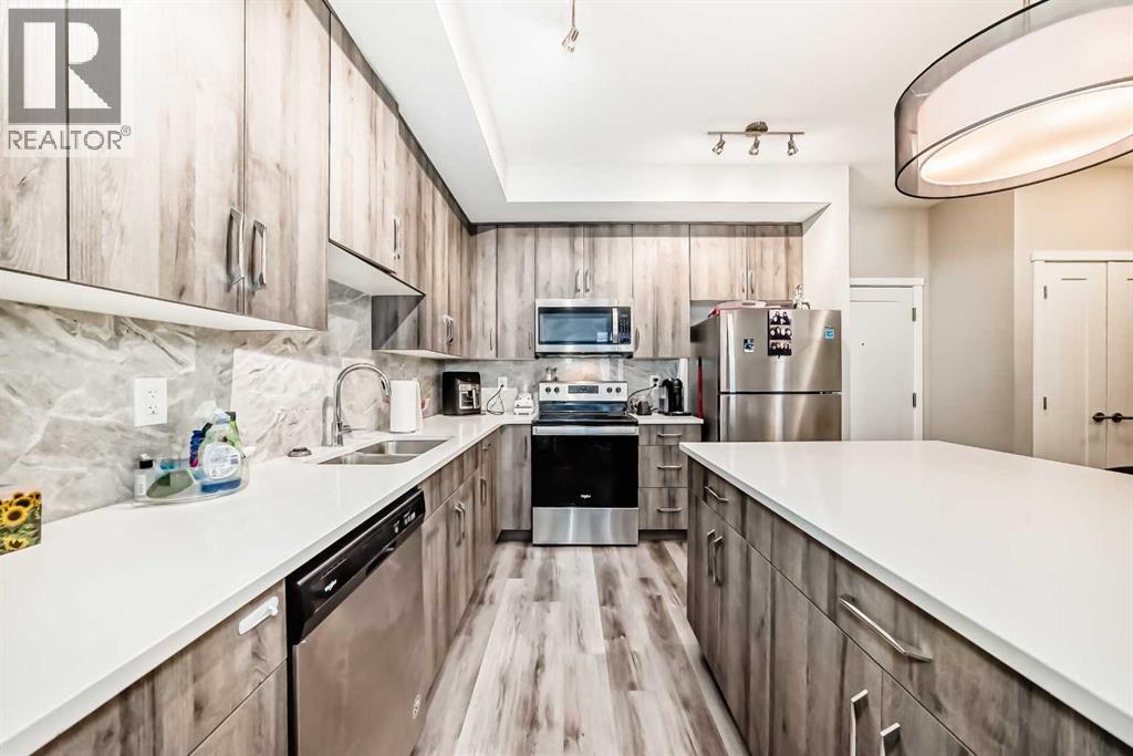108, 71 Shawnee Common Sw, Calgary, Alberta  T2Y 0R2 - Photo 11 - A2317711
