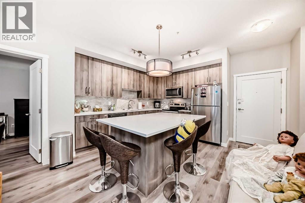 108, 71 Shawnee Common Sw, Calgary, Alberta  T2Y 0R2 - Photo 6 - A2317711