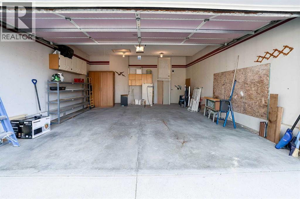 61 Cimarron Way, Okotoks, Alberta  T0L 1T5 - Photo 32 - A2316016