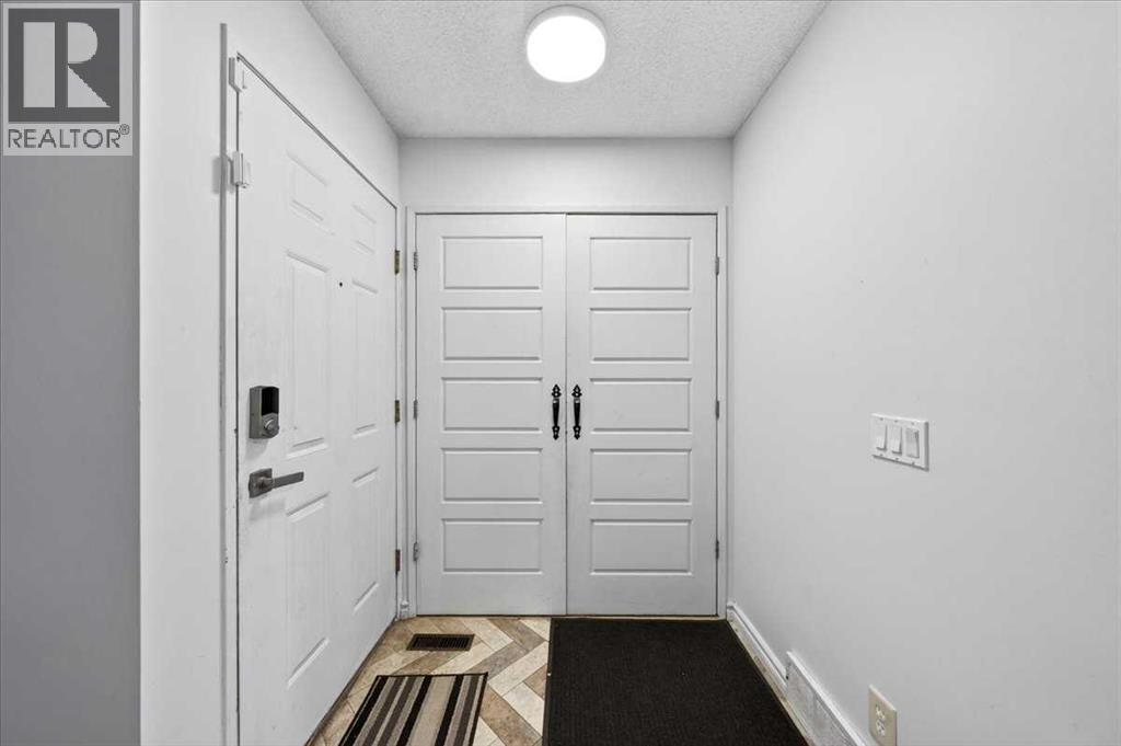 6979 Laguna Way Ne, Calgary, Alberta  T1Y 6W5 - Photo 4 - A2316513