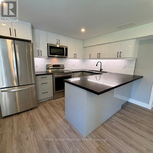 Lower - 61 Anewen Drive, Toronto, Ontario  M4A 1R9 - Photo 4 - C13238734