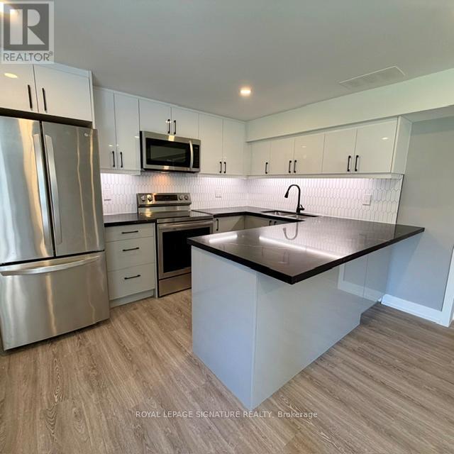 Lower - 61 Anewen Drive, Toronto, Ontario  M4A 1R9 - Photo 5 - C13238734