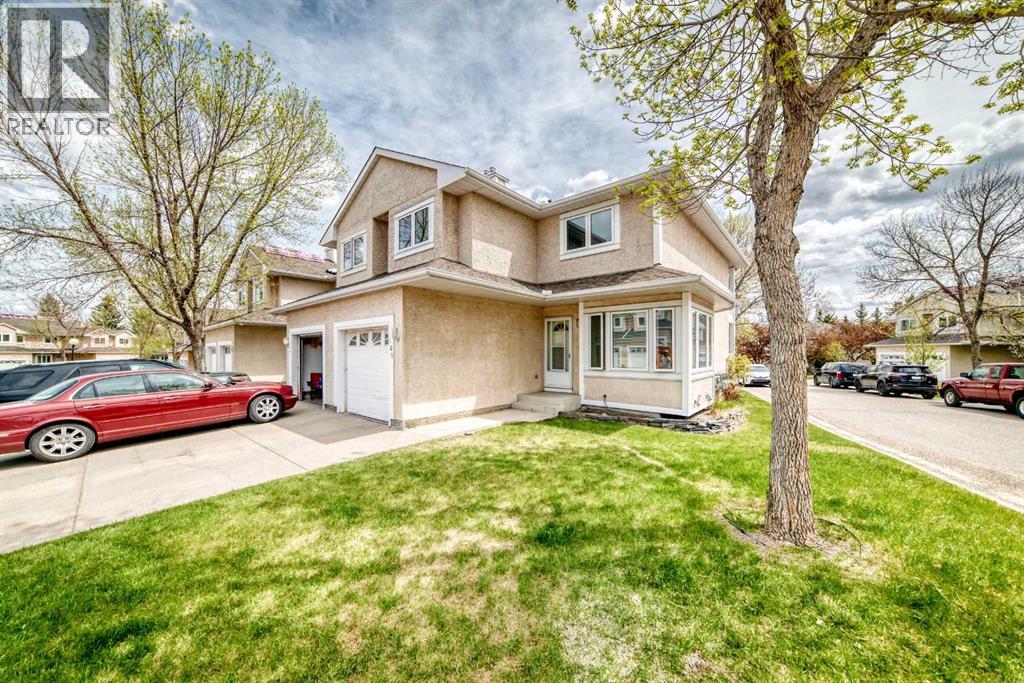 109, 388 Sandarac Drive Nw, Calgary, Alberta  T3K 4E3 - Photo 1 - A2314844