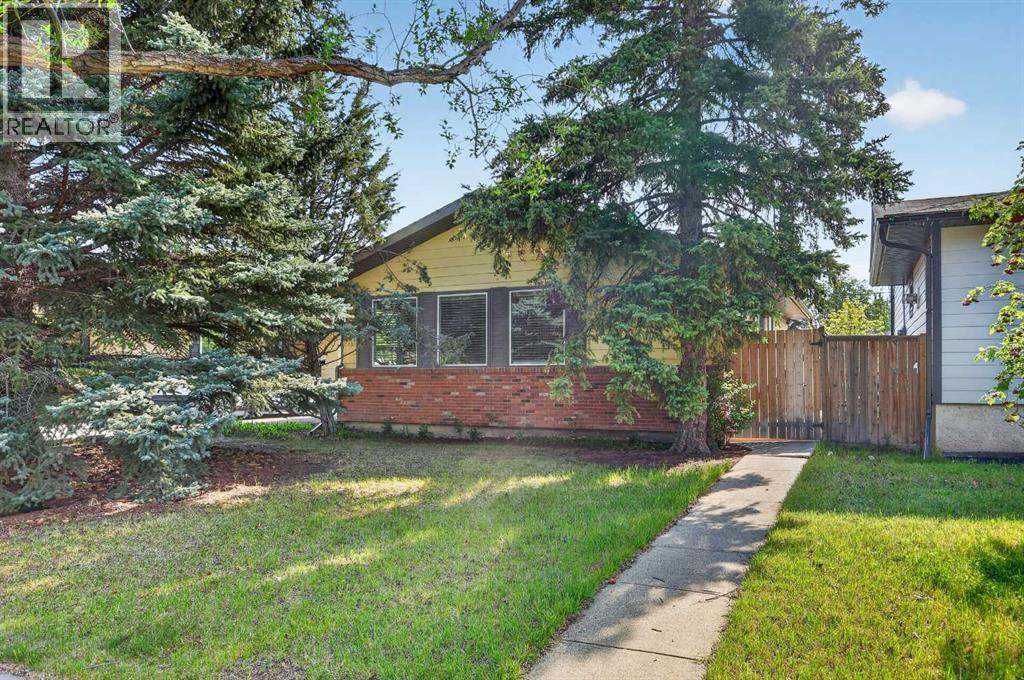 10540 Oakfield Drive Sw, Calgary, Alberta  T2W 2A9 - Photo 1 - A2315874