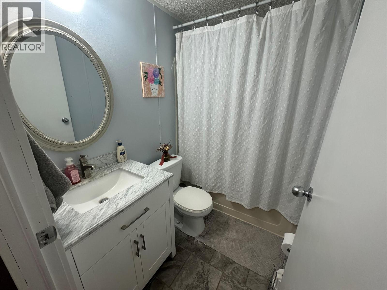 6766 Dokkie Access Road, Chetwynd, British Columbia  V0C 1J0 - Photo 12 - 10389881