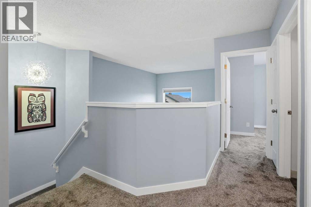 390 Douglas Ridge Circle Se, Calgary, Alberta  T2Z 3H6 - Photo 18 - A2317736