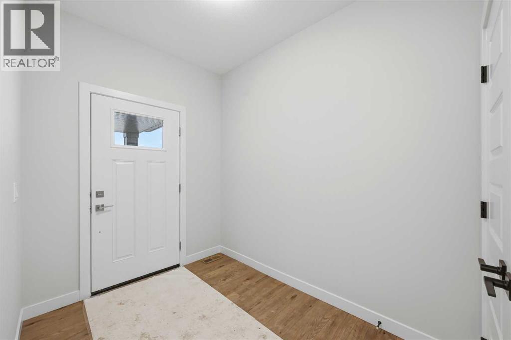 1059 Fowler Road SW, Airdrie, Alberta  T4B 5T2 - Photo 3 - A2317287