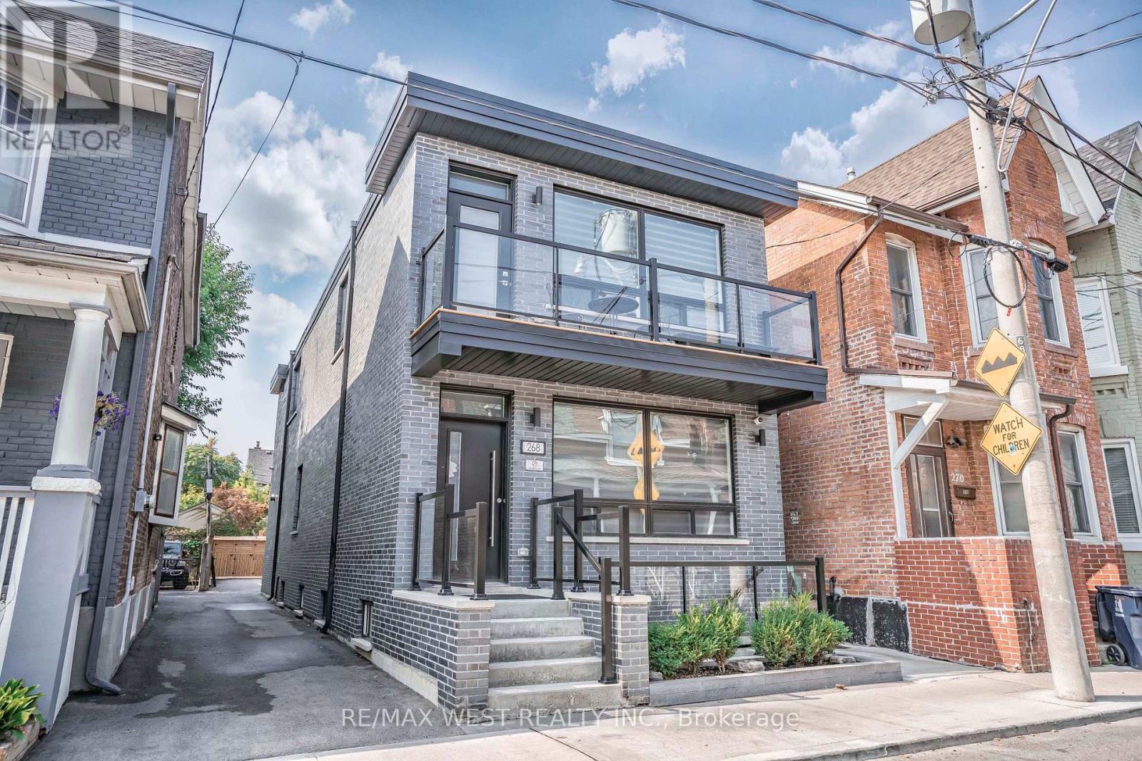<div class="slider-price">$2,299,000</div><p>268 Sterling Road, Toronto, Ontario</p>