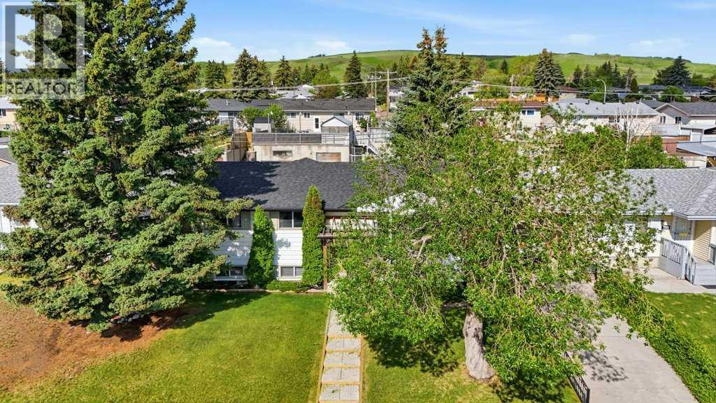7115 Huntercrest Road Nw, Calgary, Alberta  T2K 4J9 - Photo 27 - A2317206