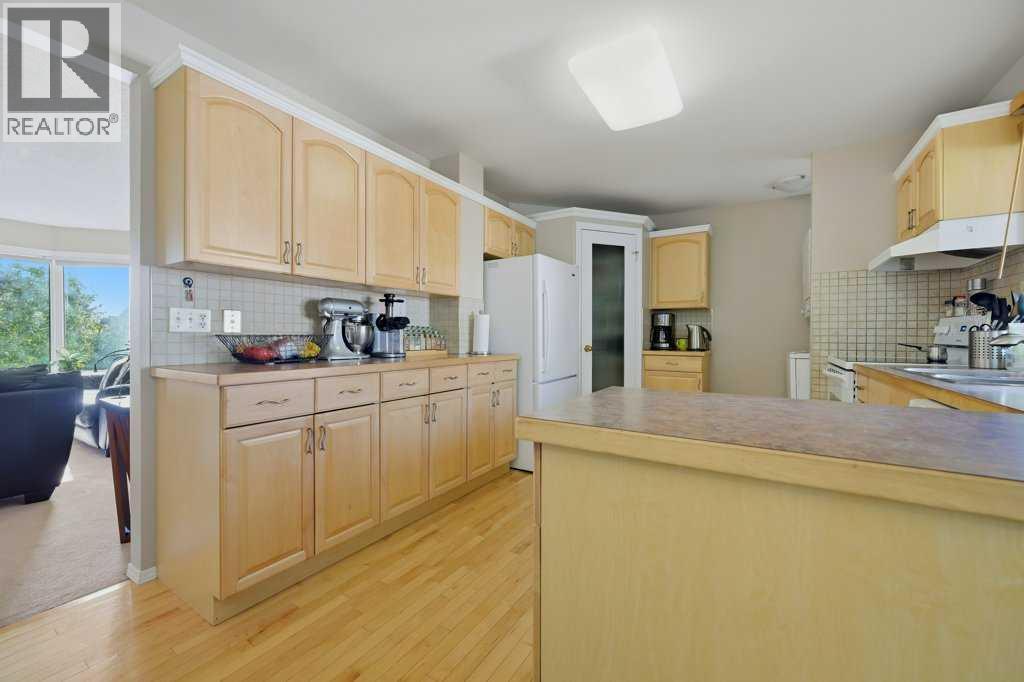 7115 Huntercrest Road Nw, Calgary, Alberta  T2K 4J9 - Photo 7 - A2317206