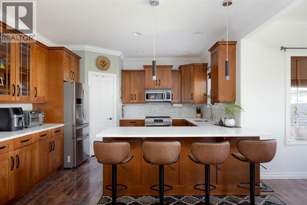 295 Rattlepan Creek Crescent, Fort Mcmurray, Alberta  T9K 2V4 - Photo 4 - A2303380