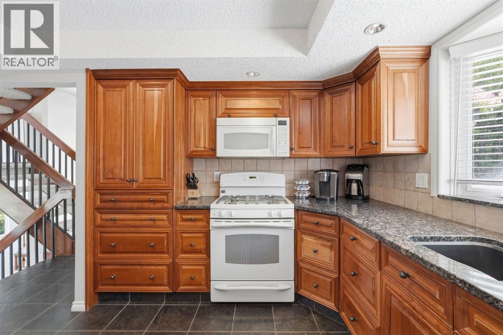 5807 Coach Hill Road SW, Calgary, Alberta  T3H 1E3 - Photo 11 - A2314860