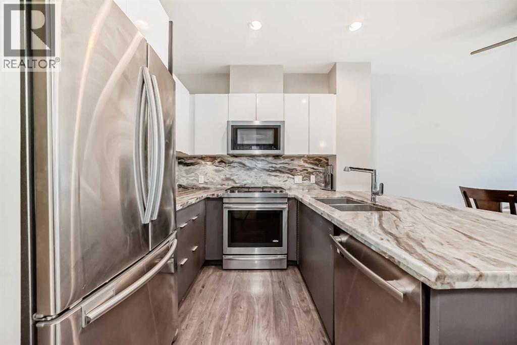 554 Riverfront Lane Se, Calgary, Alberta  T2G 1K1 - Photo 6 - A2305166