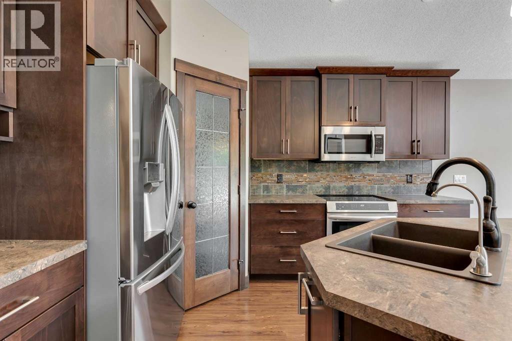 289 Riverwood Crescent, Diamond Valley, Alberta  T0L 0H0 - Photo 5 - A2316640