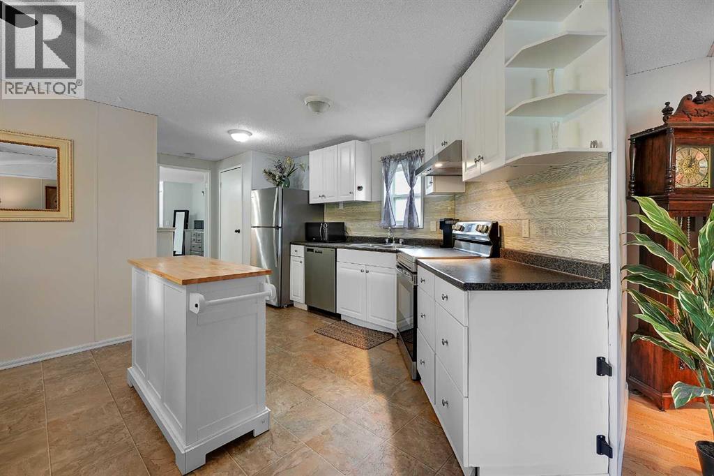 301 Stanley Avenue, Okotoks, Alberta  T1S 1M5 - Photo 11 - A2317165