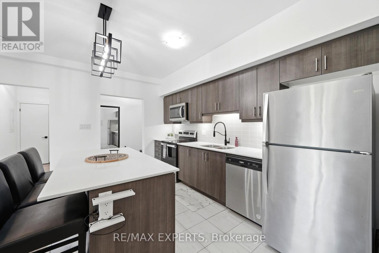 103 - 4 Spice Way, Barrie, Ontario  L9J 0M2 - Photo 3 - S13250330