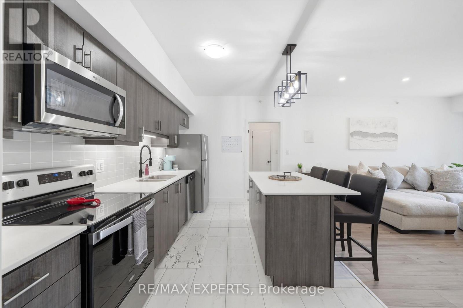 103 - 4 Spice Way, Barrie, Ontario  L9J 0M2 - Photo 4 - S13250330
