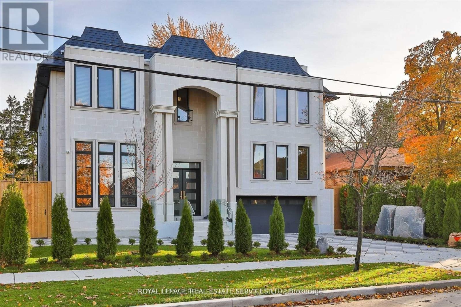 <div class="slider-price">$3,900,000</div><p>61 Dane Avenue, Toronto, Ontario</p>