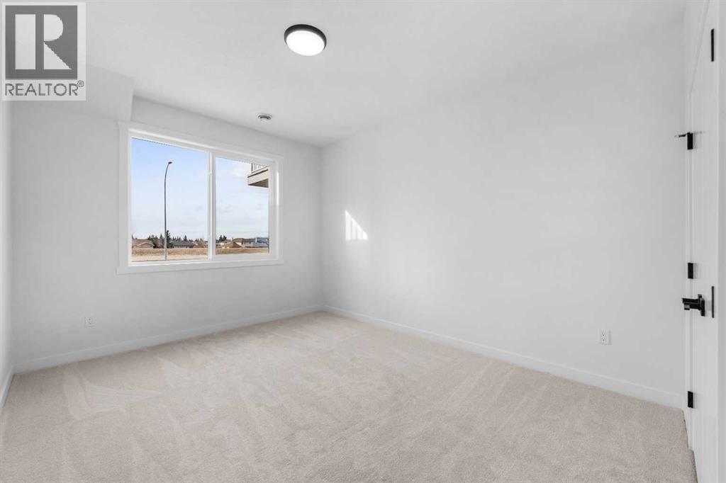 19 Wolf Crescent, Okotoks, Alberta  T1S 5V1 - Photo 27 - A2309942
