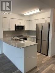 108 - 40 Via Rosedale Way, Brampton, Ontario  L6R 4W4 - Photo 5 - W13274558