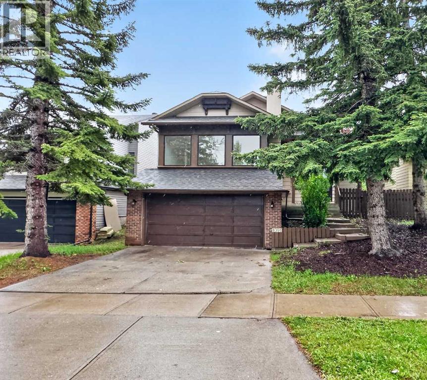 1091 Berkley Drive NW, Calgary, Alberta T3K 1S6 - Photo 1 - A2314611