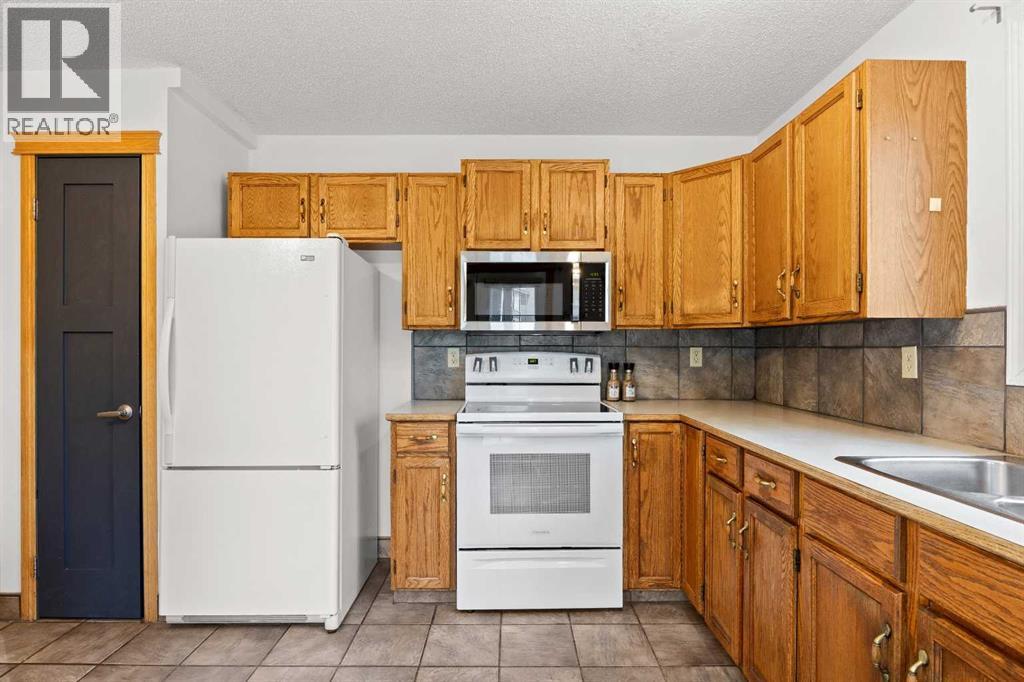 159 Shawinigan Drive Sw, Calgary, Alberta  T2Y 2W1 - Photo 10 - A2317667
